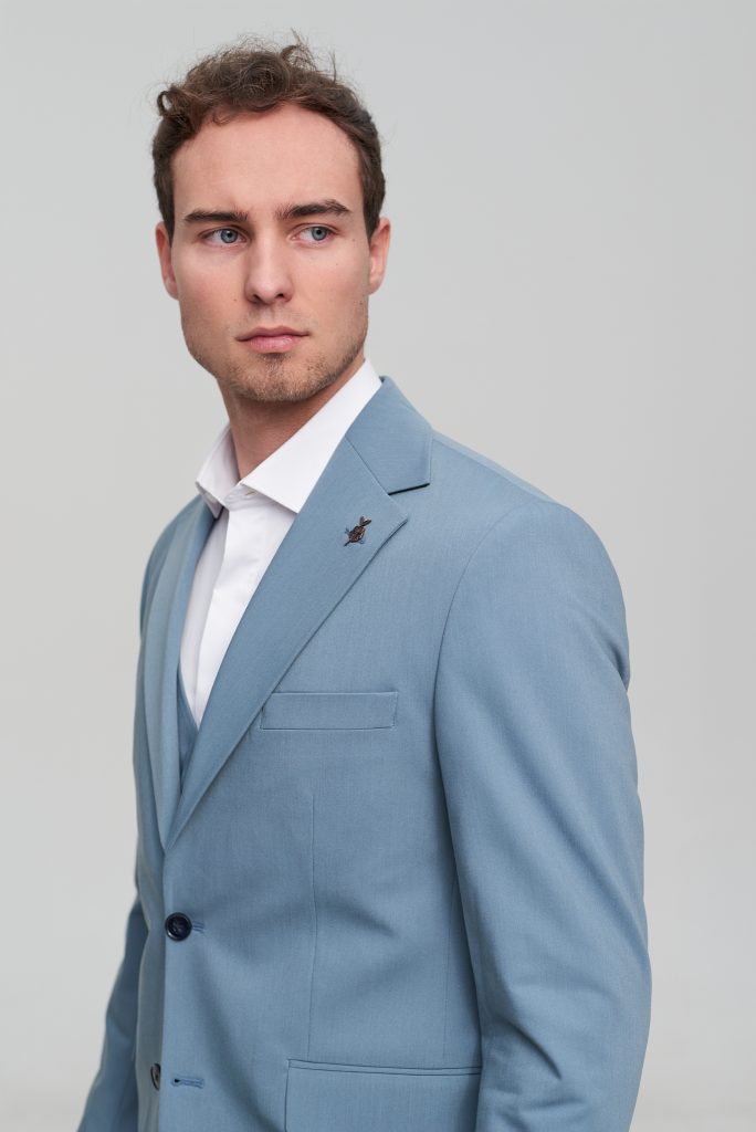 Класичний костюм світло-смарагдовий